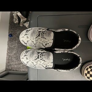 Snakeskin slip ons